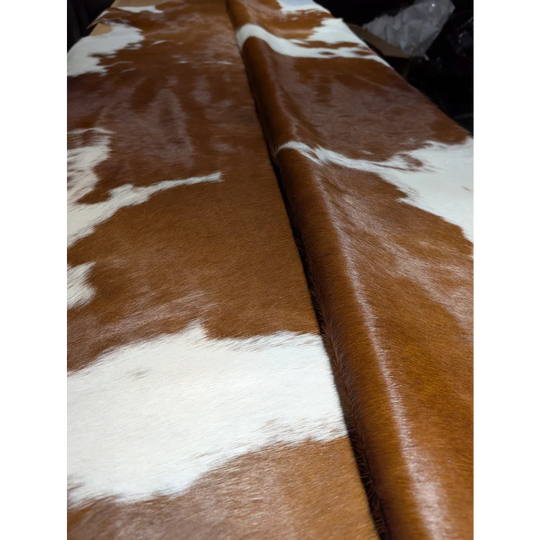 Large BRNWHT141 cowhide rug with brown white patches, soft underfoot