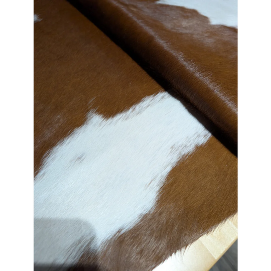Extra large cowhide rug with brown white patches, soft underfoot aura