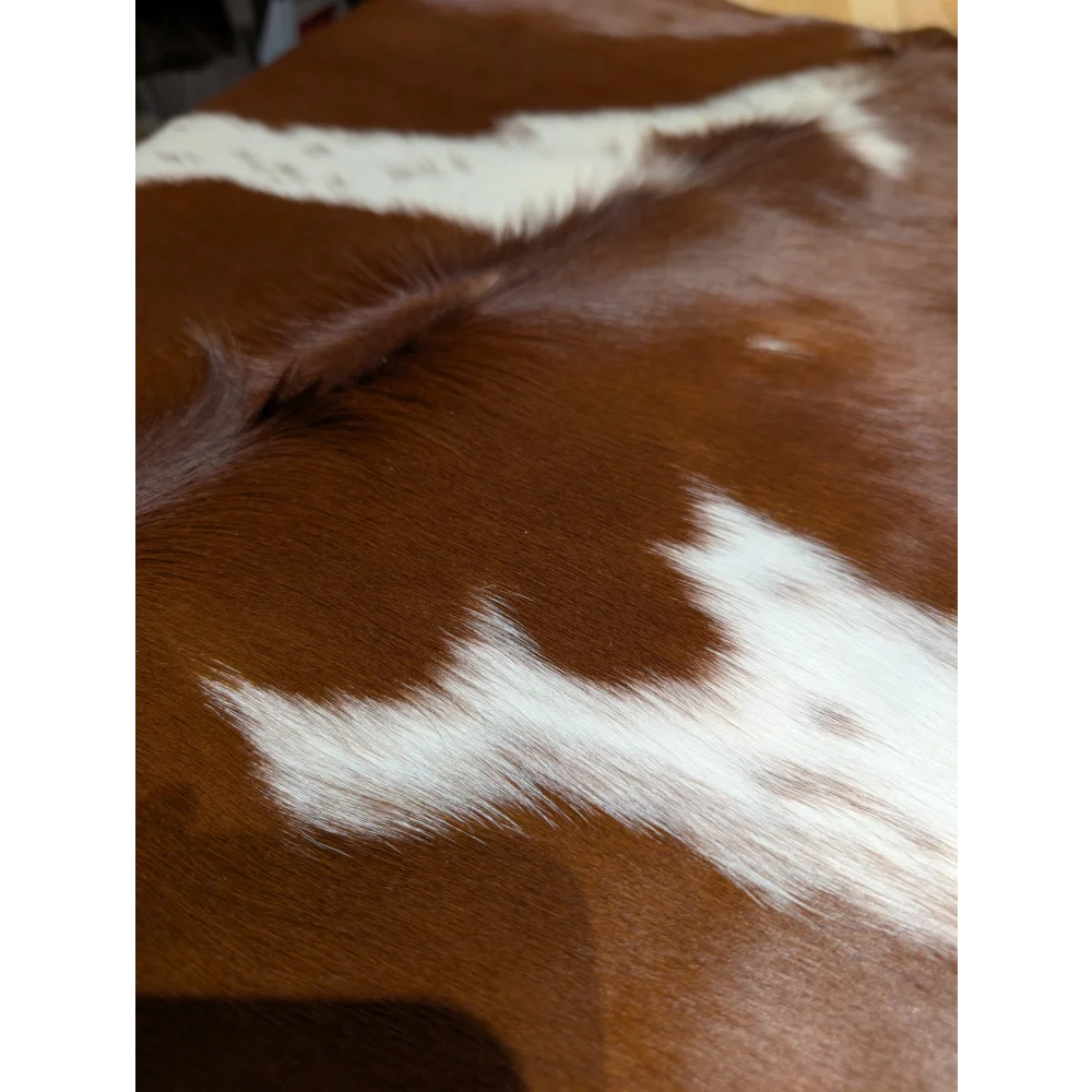 BRNWHT147 extra large cowhide rug with brown white patches, soft underfoot