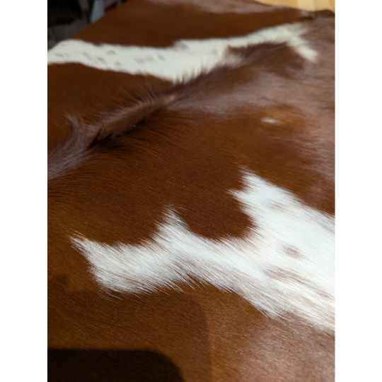 BRNWHT147 extra large cowhide rug with brown white patches, soft underfoot