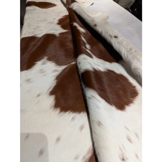 BRNWHT147 extra large cowhide rug with brown white patches, soft underfoot