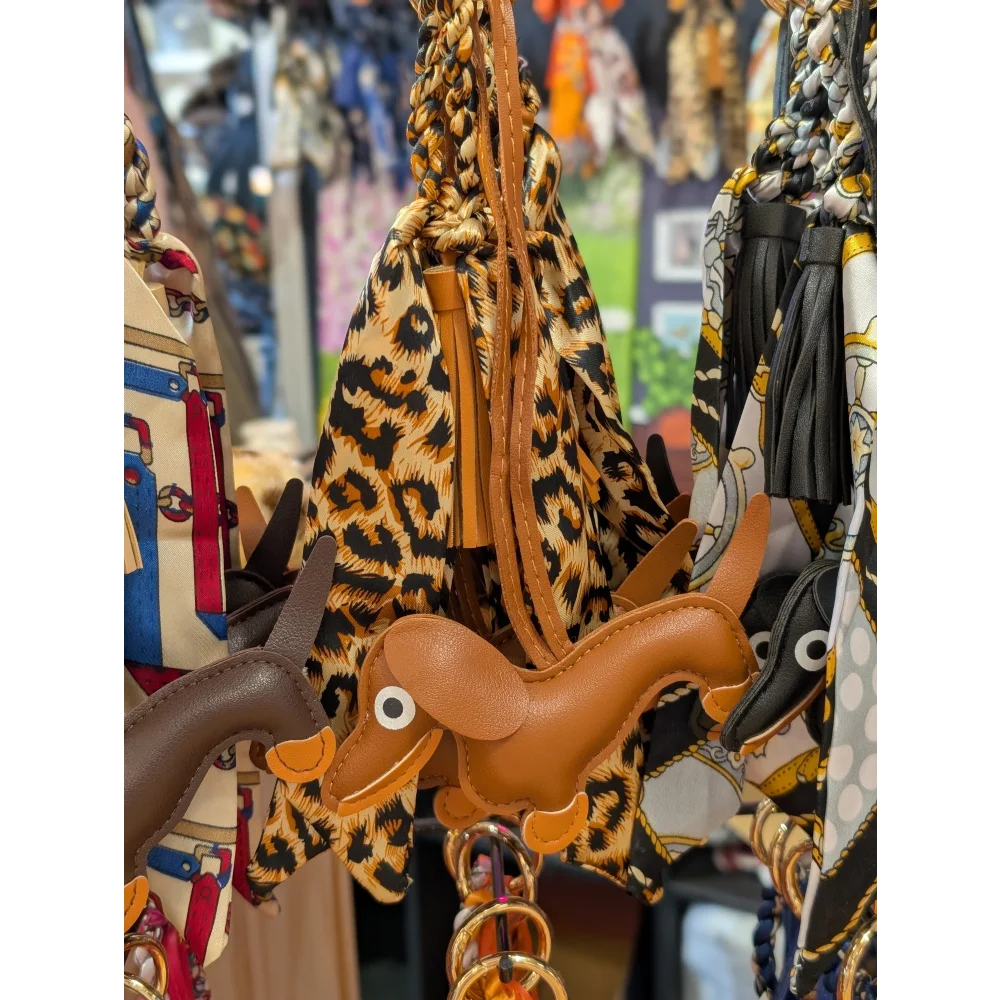 Brown dachshund scarf bag charm keychain with tan tassel