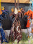 Brown horse bag charm with tassel, white wings and printed scarf