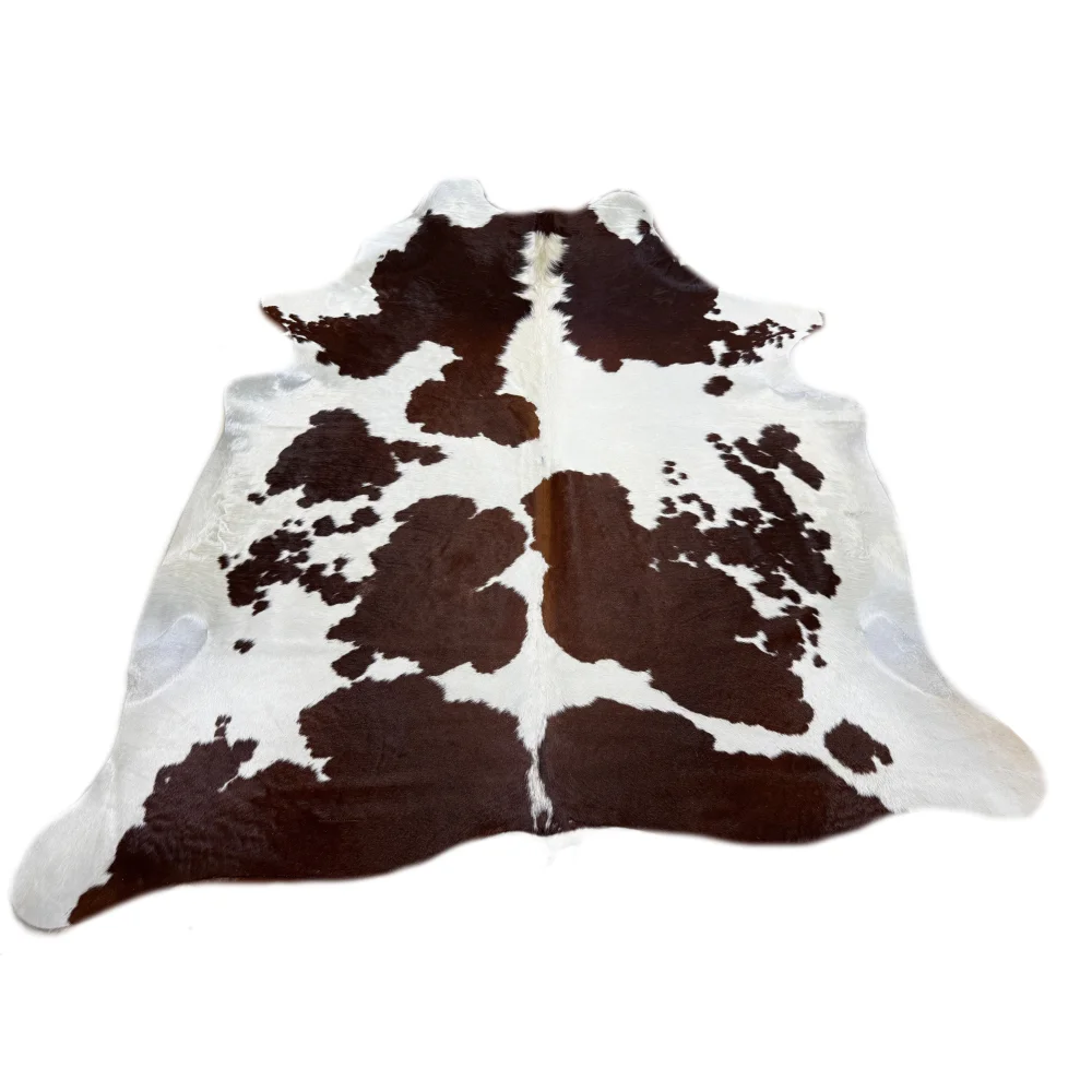 Large cowhide BrownWhite#56 rug with soft underfoot brown patches