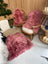 Bubblegum colour merino sheepskin rug with soft fluffy texture and natural edges in dusty pink shade arriving soon