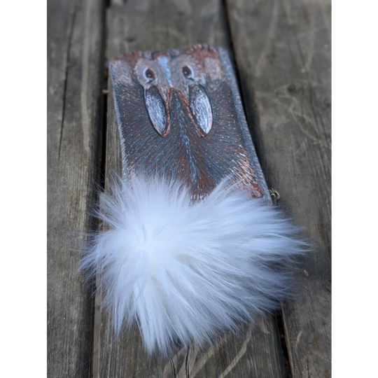 Bunny coin purse with sheepskin tail featuring rustic leather owl carving and fluffy white pom-pom detail