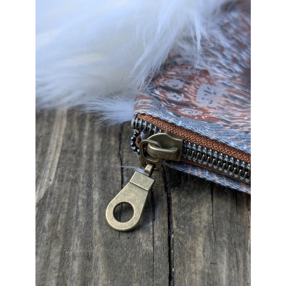 Vintage-style cotton canvas bunny coin purse with earth-toned pattern sheepskin tail and brass zipper hardware