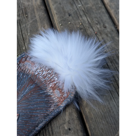 Bunny coin purse with white fluffy sheepskin tail attached to patterned cotton canvas fabric accessory