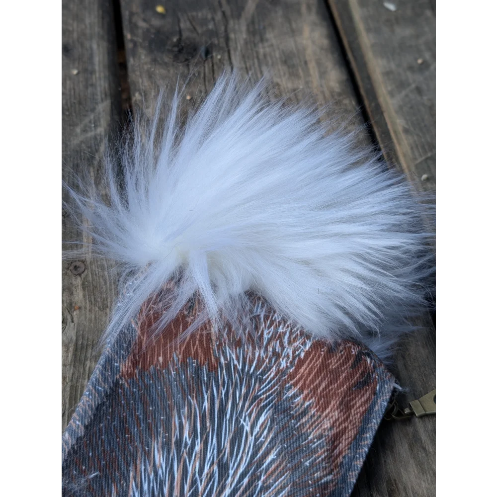 White faux fur sheepskin tail pom-pom on bunny coin purse made of cotton canvas with cute pattern