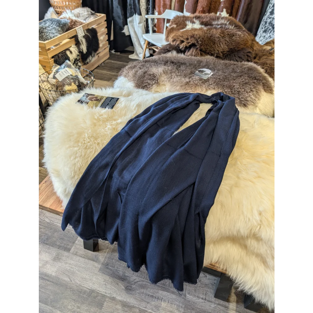 Soft navy blue cashmere scarf with wool texture and classic design
