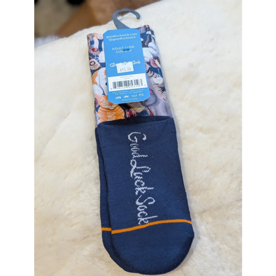 Navy blue good luck socks with orange yellow floral accents in Cats With Wine design