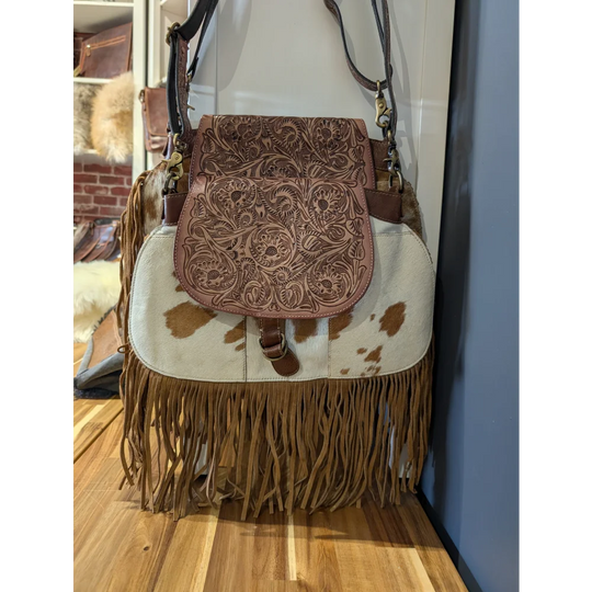 Classic country fringed hand-tooled leather bag with hair-on hide