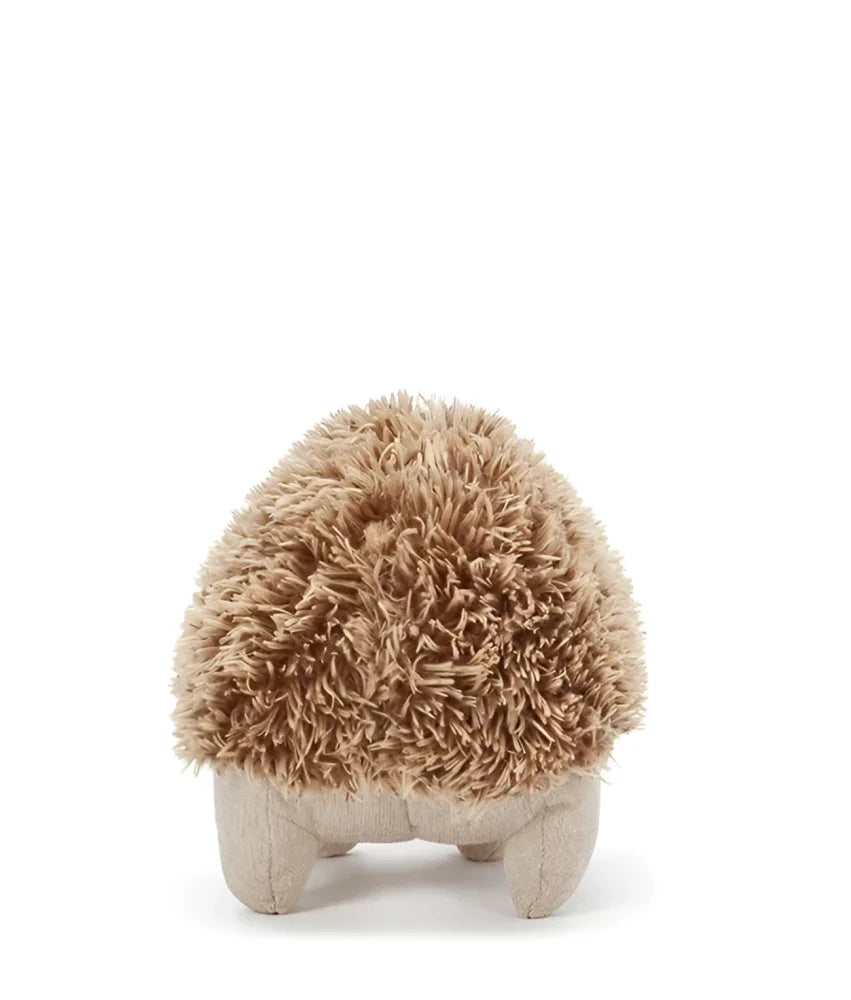 A plush hedgehog toy called clearance spike the echidna with a fluffy tan body and beige fabric legs