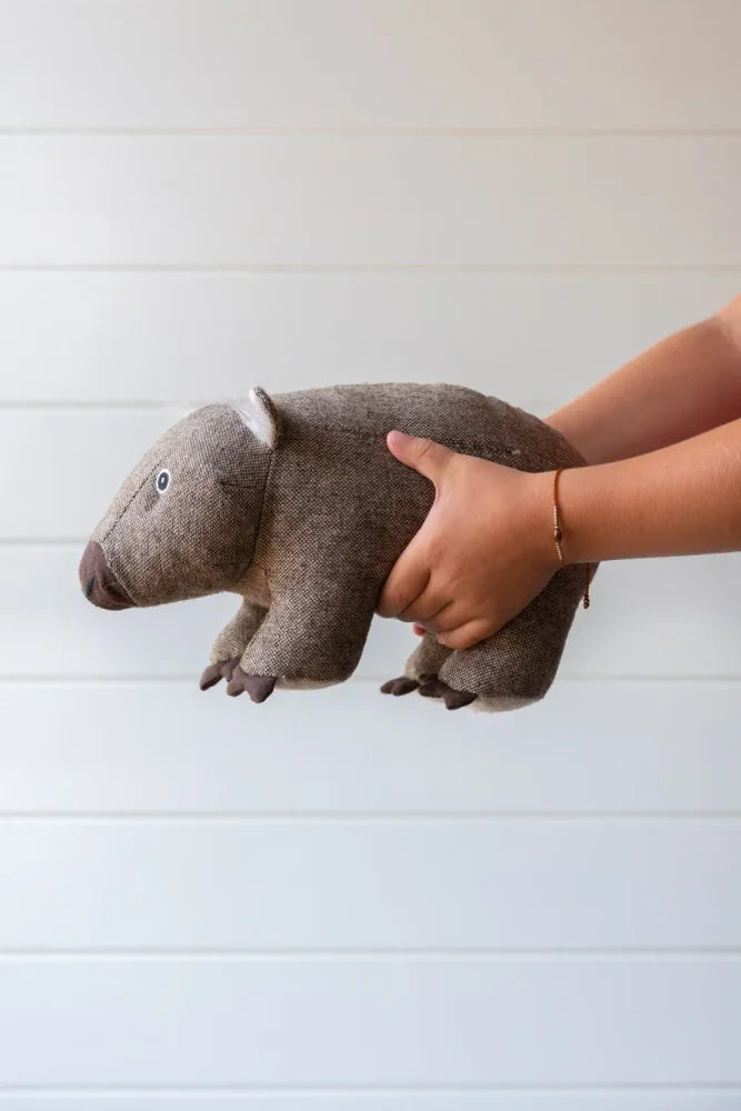 Clearance wally the wombat plush toy is a soft textured gray woolen stuffed animal with stitched black eyes and a brown nose