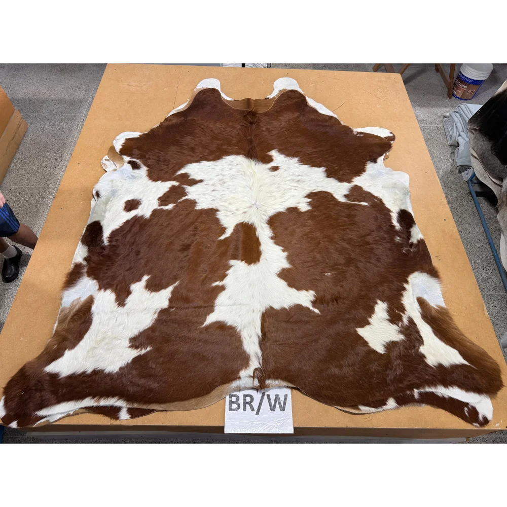 Large cowhide rug with brown and white patches, extra large leather texture