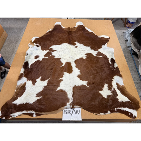 Large cowhide rug with brown and white patches, extra large leather texture