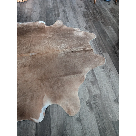 Large cowhide rug cow10 in natural brown and white with soft textured fur perfect for beautiful rugs with unique characteristics