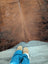Brown large cowhide rug with natural fur texture and subtle darker patches showcasing unique characteristics