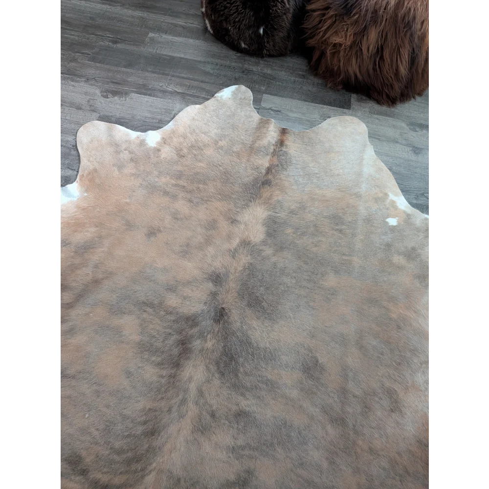 Large cowhide rug cow8 with beautiful rugs featuring natural tones and unique characteristics in brown and beige hues