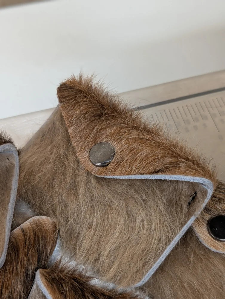 Brown faux fur clutch with silver snap closure and gray trim perfect for angus oliver cowhide card holders canada