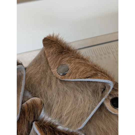 Brown faux fur clutch with silver snap closure and gray trim perfect for angus oliver cowhide card holders canada