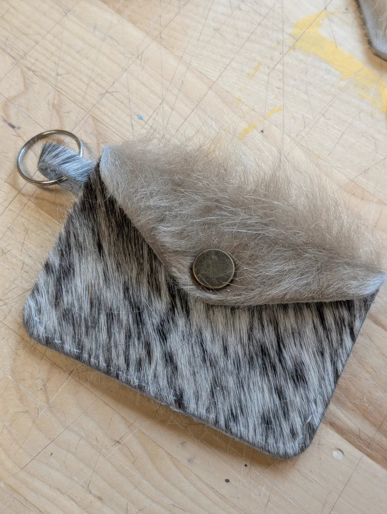 Gray and black cowhide keychain card holder pouch with fuzzy flap closure perfect for carrying cards and keys