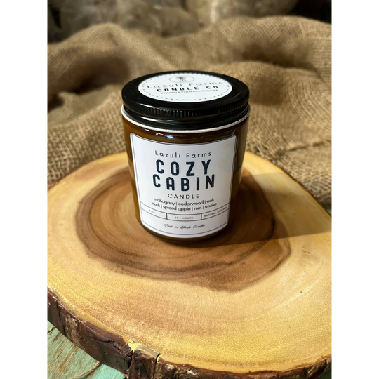 Cozy Cabin Candle by Lazuli Farms on rustic wood
