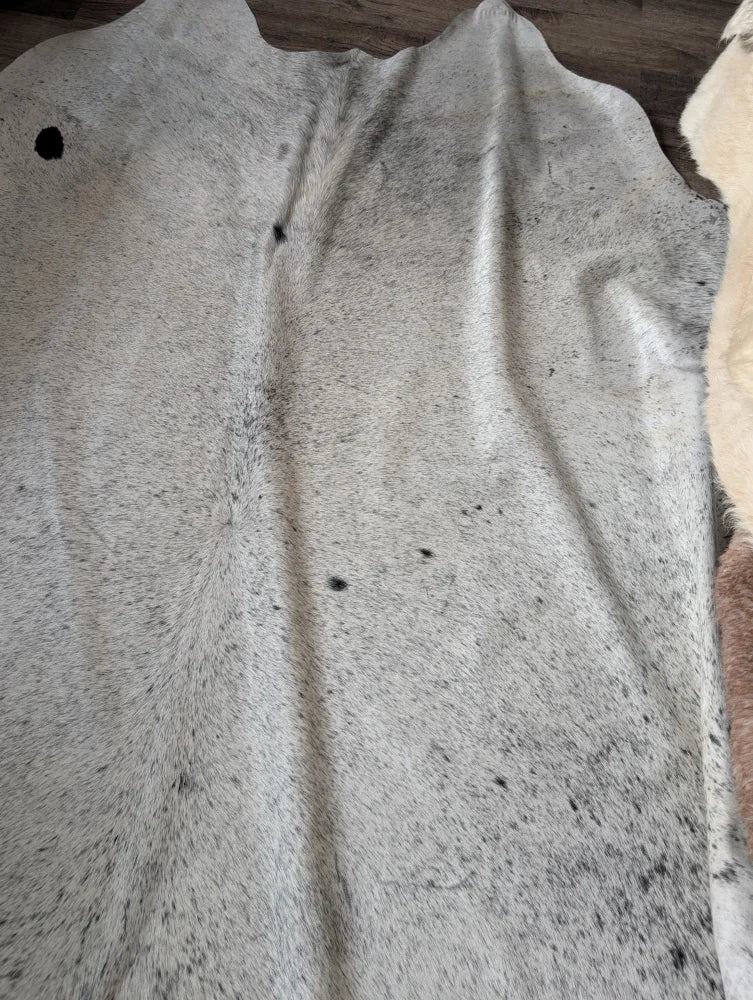Massive 93x87 Angus Oliver cowhide rug, white black speckled, Canada