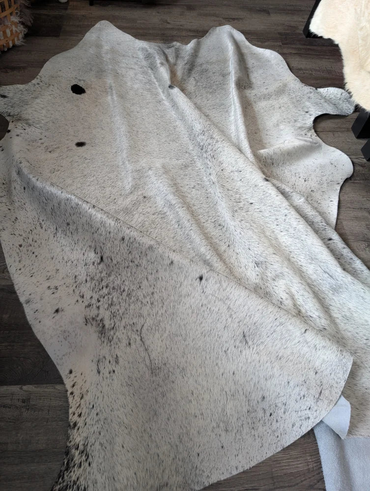 Massive 93x87 Angus Oliver cowhide rug, white black speckled, Canada