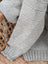 Light gray cream woolen calgary cardigan with soft fleece texture and ribbed cuffs made from zealand wool