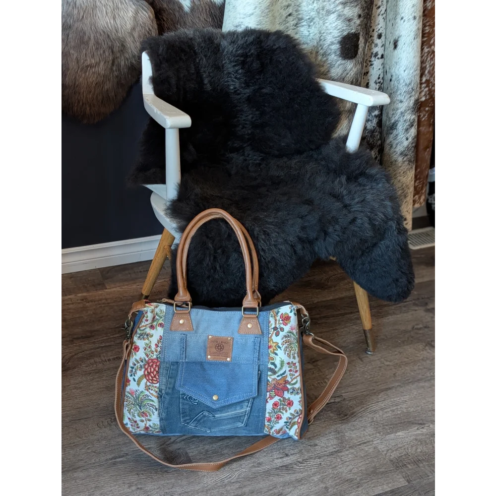Crimson Glade Tote Bag with upcycled denim floral patchwork and tan leather handles