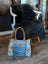 Crimson Glade Tote Bag with upcycled denim floral patchwork and tan leather handles