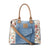 Crimson Glade Tote in upcycled denim floral patchwork with leather handles