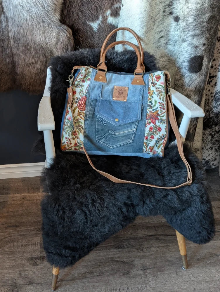 Crimson Glade Tote Bag with upcycled denim floral patchwork and tan leather handles