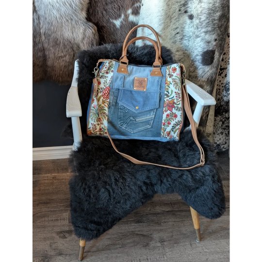 Crimson Glade Tote Bag with upcycled denim floral patchwork and tan leather handles