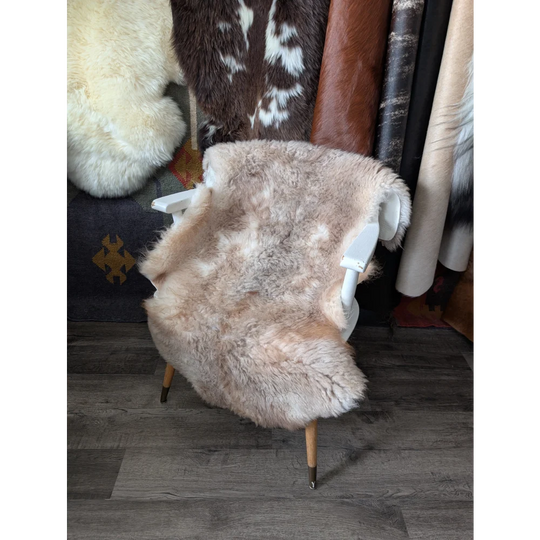 Cozy oeko tex fluffy cloud sheepskin rug on white chair, 41x27in