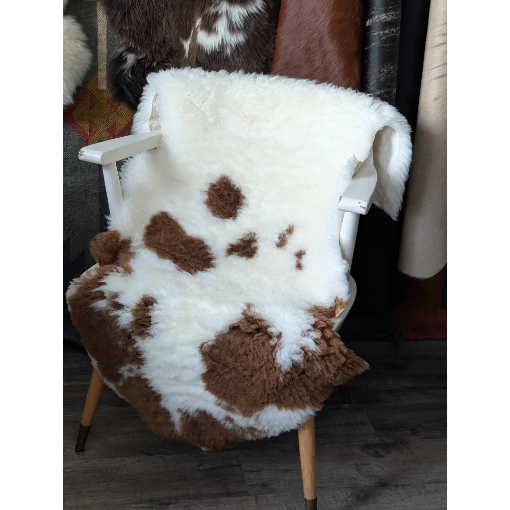 Fluffy cloud oeko tex sheepskin rug on white chair, 43x25 curly wool