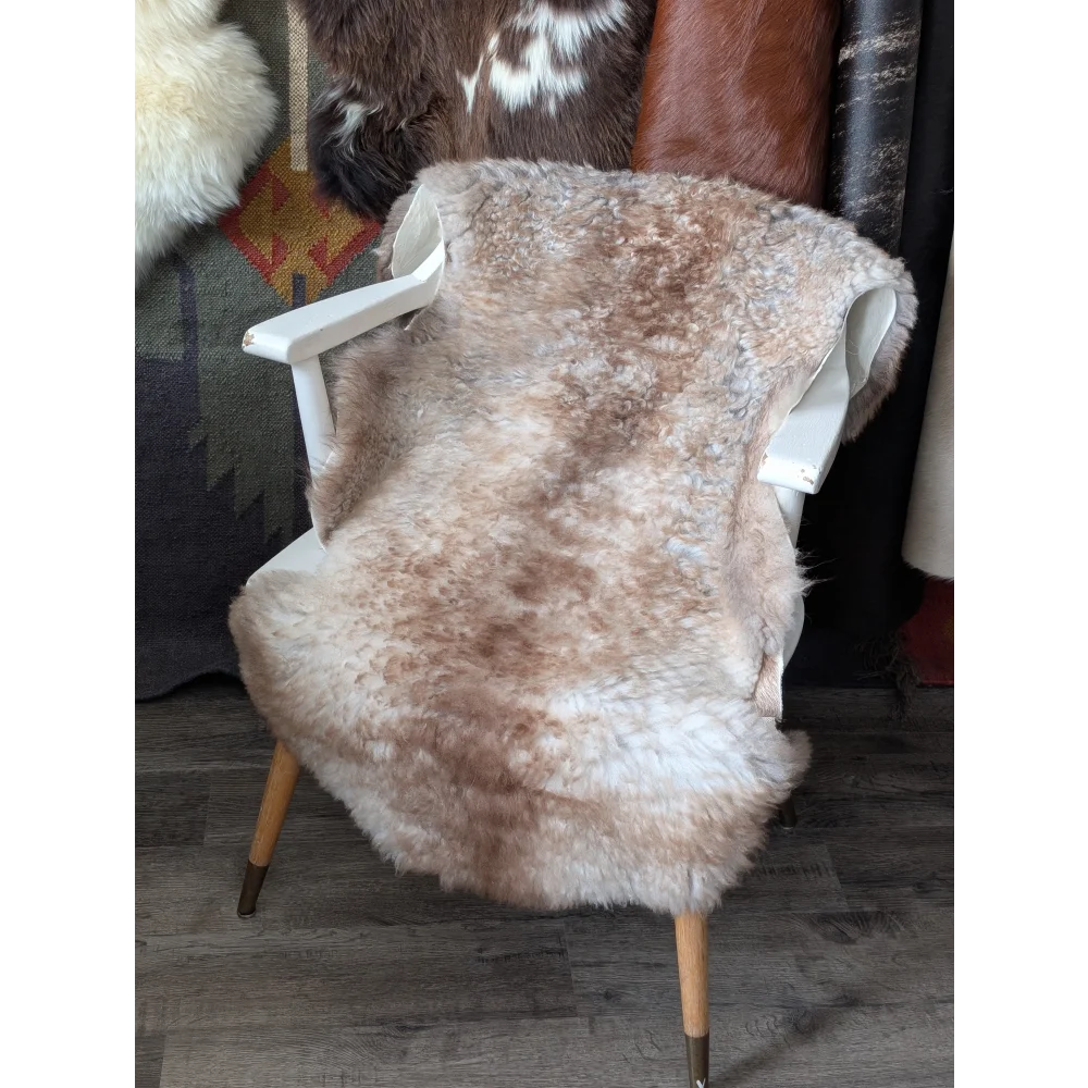 41x26 fluffy cloud sheepskin rug on white chair back