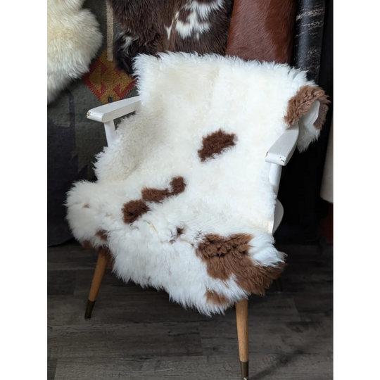 Fluffy cloud grade B sheepskin chair cover in natural colours, 41.5x27in
