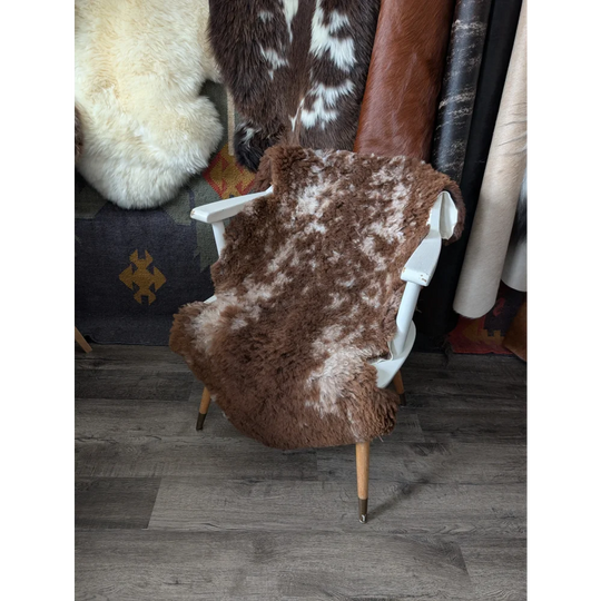 Fluffy cloud like Oeko-Tex sheepskin rug on Angus Oliver chair