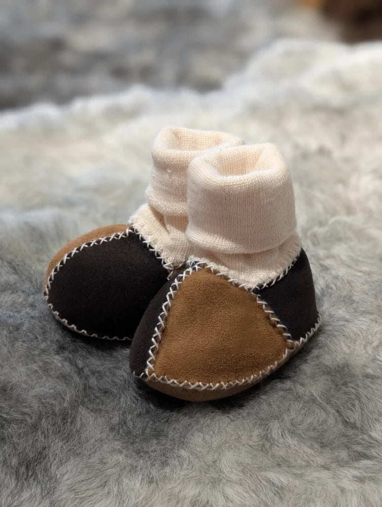 Fabulous sheepskin baby booties with patchwork design and stretchy fabric cuffs