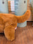 A plush orange-brown dachshund toy with soft fuzzy texture and floppy ears perfect for kids and collectors