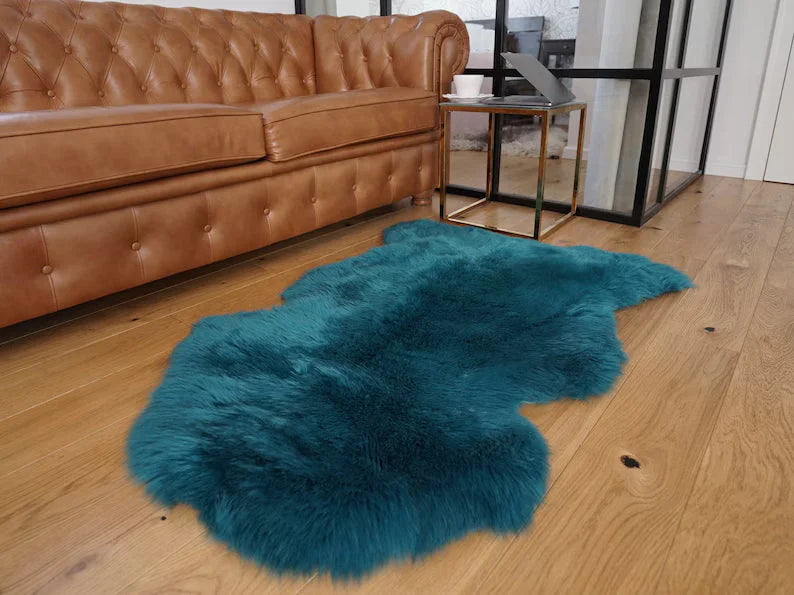 Dark green aqua merino sheepskin rug with plush teal faux fur and natural irregular shape arriving soon