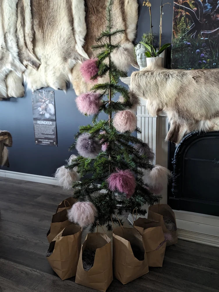 Dark grey sheepskin pom pom on Christmas tree