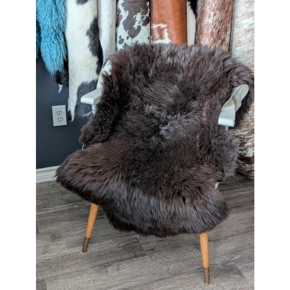 Gorgeous fluffy 44’’ x 31’’ rare British sheepskin rug on white chair