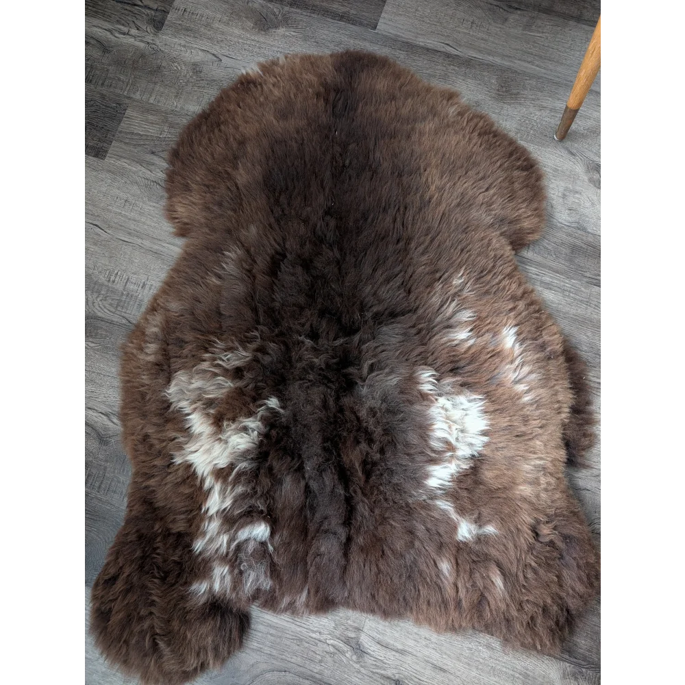 Gorgeous 47x33 fluffy rare British sheepskin rug with white patches