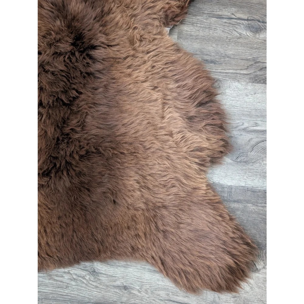 Gorgeous fluffy 46x31 British sheepskin rug with curly fur