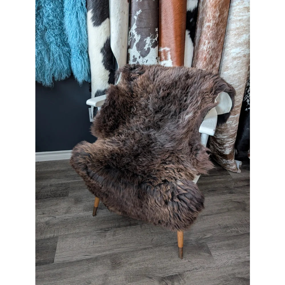 Gorgeous fluffy 45x30 rare British sheepskin rug on white chair