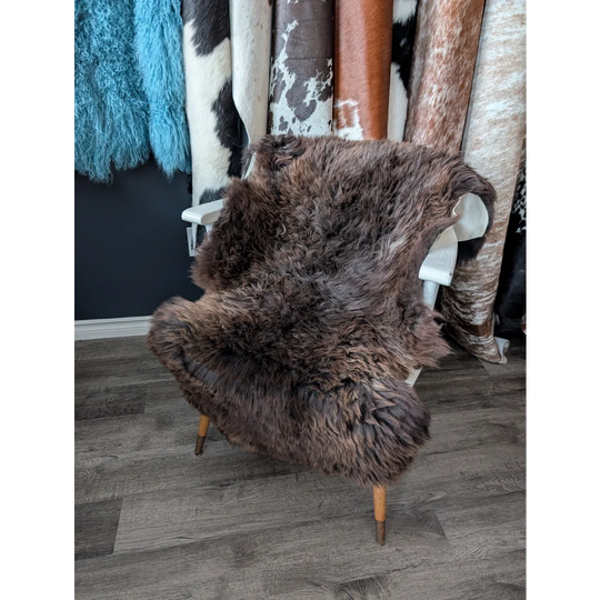 Gorgeous fluffy 45x30 rare British sheepskin rug on white chair