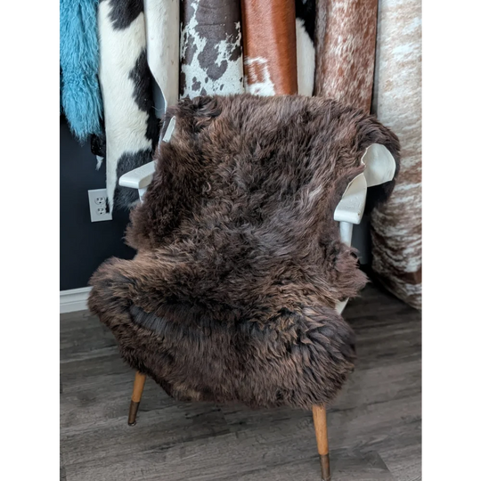 Gorgeous fluffy 45’’ x 30’’ rare British sheepskin rug on white chair